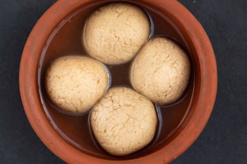Kolkata: Indulge in kathi rolls, puchkas, kosha mangsho, and end with mishti doi and rasgulla.