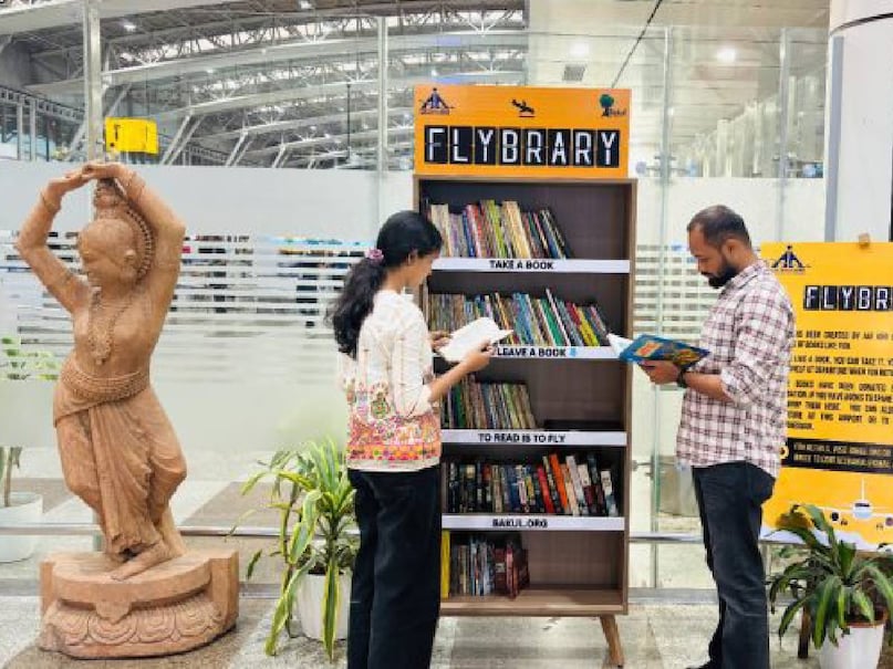 AAI Flybrary, Indian Airports, Bhopal Airport Library, Imphal Airport, Bikaner Airport, Airport Reading Zone, AAI Initiative, Flybrary Project, Reading Corner India, Airport Books, एएआई फ्लाइब्रेरी, एयरपोर्ट लाइब्रेरी, भोपाल एयरपोर्ट, इंफाल एयरपोर्ट, बीकानेर एयरपोर्ट, एयरपोर्ट पर किताबें, फ्लाइब्रेरी पहल, इंडियन एयरपोर्ट अथॉरिटी, रीडिंग कॉर्नर, यात्रा अनुभव AAI Flybrary, Indian Airports, Bhopal Airport Library, Imphal Airport, Bikaner Airport, Airport Reading Zone, AAI Initiative, Flybrary Project, Reading Corner India, Airport Books, एएआई फ्लाइब्रेरी, एयरपोर्ट लाइब्रेरी, भोपाल एयरपोर्ट, इंफाल एयरपोर्ट, बीकानेर एयरपोर्ट, एयरपोर्ट पर किताबें, फ्लाइब्रेरी पहल, इंडियन एयरपोर्ट अथॉरिटी, रीडिंग कॉर्नर, यात्रा अनुभव