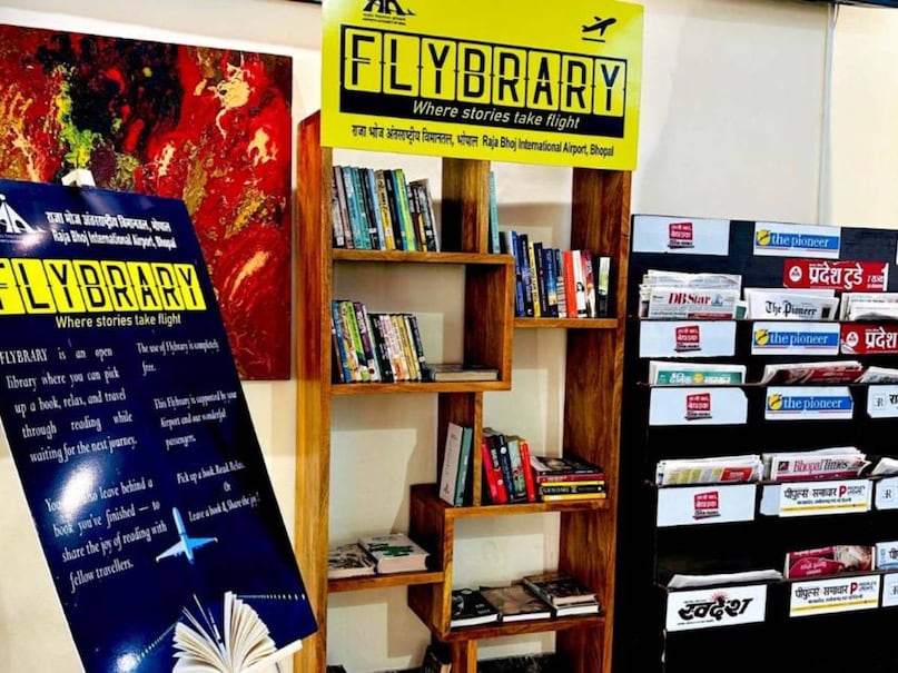 AAI Flybrary, Indian Airports, Bhopal Airport Library, Imphal Airport, Bikaner Airport, Airport Reading Zone, AAI Initiative, Flybrary Project, Reading Corner India, Airport Books, एएआई फ्लाइब्रेरी, एयरपोर्ट लाइब्रेरी, भोपाल एयरपोर्ट, इंफाल एयरपोर्ट, बीकानेर एयरपोर्ट, एयरपोर्ट पर किताबें, फ्लाइब्रेरी पहल, इंडियन एयरपोर्ट अथॉरिटी, रीडिंग कॉर्नर, यात्रा अनुभव AAI Flybrary, Indian Airports, Bhopal Airport Library, Imphal Airport, Bikaner Airport, Airport Reading Zone, AAI Initiative, Flybrary Project, Reading Corner India, Airport Books, एएआई फ्लाइब्रेरी, एयरपोर्ट लाइब्रेरी, भोपाल एयरपोर्ट, इंफाल एयरपोर्ट, बीकानेर एयरपोर्ट, एयरपोर्ट पर किताबें, फ्लाइब्रेरी पहल, इंडियन एयरपोर्ट अथॉरिटी, रीडिंग कॉर्नर, यात्रा अनुभव
