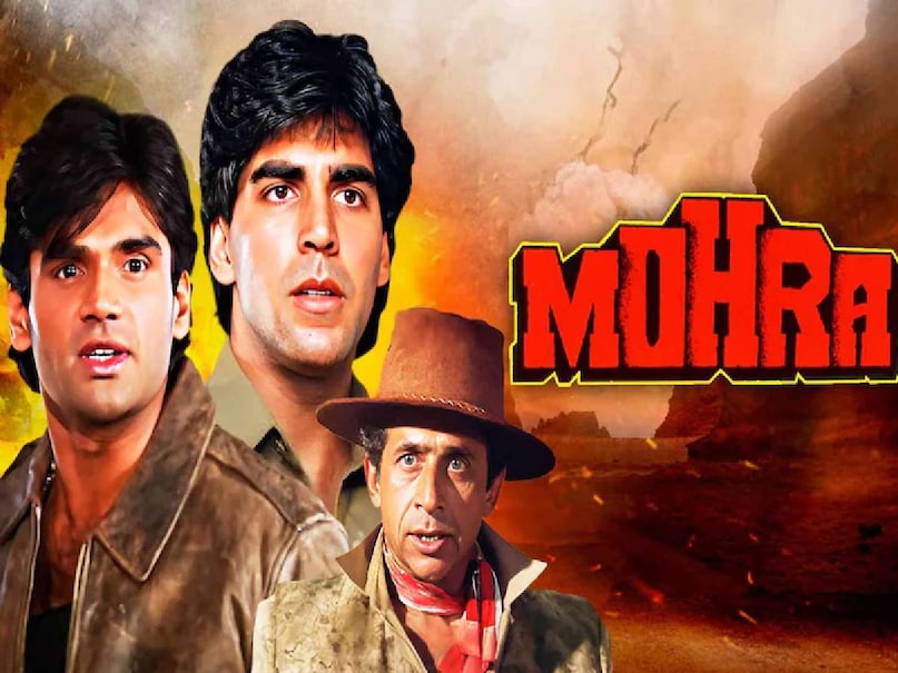 akshay kumar sunil shetty ka mohra film, akshay kumar mohra picture, Mohra movie akshay kumar, mohra movie suniel shetty ki, mohra film tu cheez badi hai song, Mohra Movie Unknown Facts, Mohra Movie budget, Mohra Movie box office collection, Mohra Movie cast, Mohra hit or flop, What was special about the Mohra film, Mohra movie director, Mohra movie Raveena Tandon, Na Kajre Ki Dhar mohra moive, Tu Cheez Badi Hai Mast Mast movie song, Na Kajre Ki Dhar song muksh kumar, Mohra movie verdict, poonam jhawer na kajre ki dhar, poonam jhawer photos