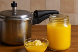 मलाई में डालिए बस एक चीज और बनाइए ढेर सारा देसी घी, प्रेशर कुकर की ट्रिक