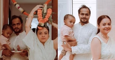 देवोलीना और उनके पति शहनवाज शेख ने गृह प्रवेश की पूजा साथ में की. गृह प्रवेश के दौरान देवोलीना ने अपने सिर पर माला चढ़ा कलश अपने सिर पर रखकर पकड़ा हुआ था, जबकि उनके पति ने एक गोद में बेटे जॉय को पकड़ा था, दूसरे हाथ में पूजा की थाली पकड़े हुए थे. (फोटो साभारः इंस्टाग्राम @devoleena)