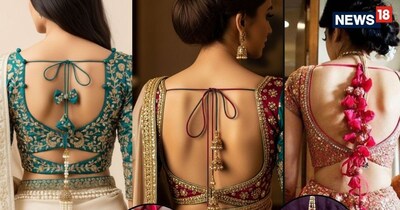  ब्लाउज या चोली के बैक साइड पर गुच्‍छे में सजा हेवी वर्क वाला लंबा लटकन आउटफिट की खूबसूरती को कई गुना बढ़ा देता है.