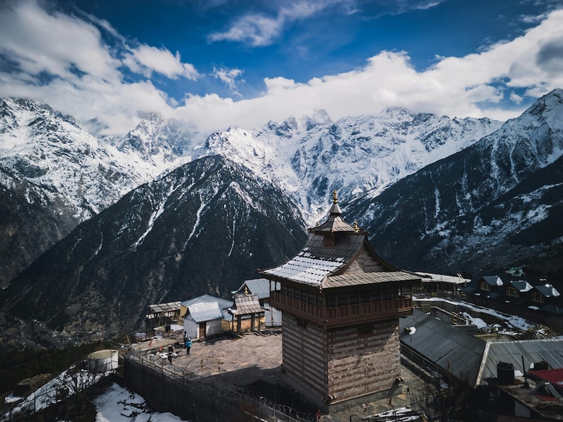 Kalpa: Nestled in Kinnaur, Kalpa is famous for apple orchards and views of the Kinner Kailash range. Traditional wooden architecture, serene streets, and panoramic landscapes make it a must-visit offbeat destination.