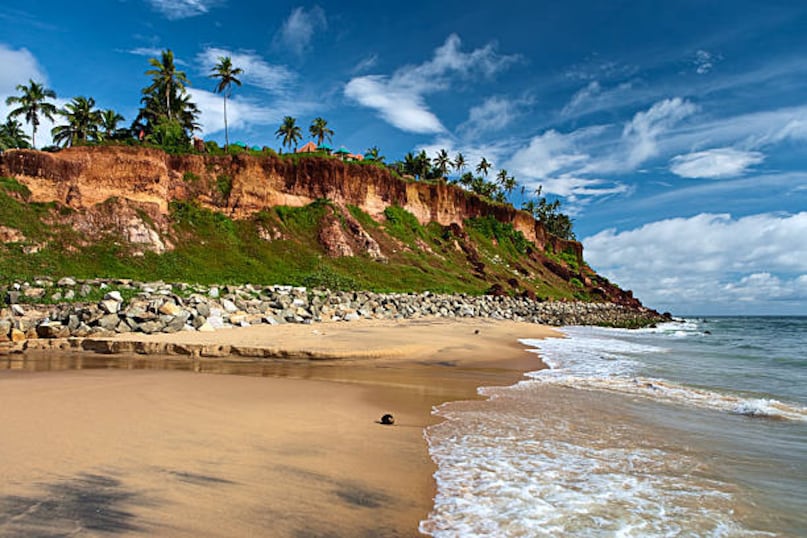 Varkala Beach, Kerala: Varkala Beach boasts dramatic cliffs overlooking the Arabian Sea. Its natural springs, laid-back vibe, and beachfront cafes create a unique blend of relaxation and adventure, while the golden sands provide the perfect backdrop for sunbathing and sunset strolls. Varkala Beach, Kerala: Varkala Beach boasts dramatic cliffs overlooking the Arabian Sea. Its natural springs, laid-back vibe, and beachfront cafes create a unique blend of relaxation and adventure, while the golden sands provide the perfect backdrop for sunbathing and sunset strolls.