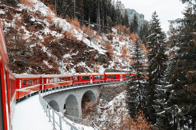 Switzerland: Switzerland boasts punctual trains and the breathtaking Glacier Express. In 2026, the network remains a marvel of engineering, effortlessly connecting turquoise lakes and jagged alpine peaks through panoramic windows that offer postcard-perfect views.