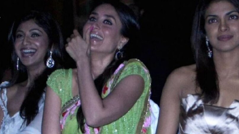 Kareena Kapoor, Shilpa Shetty and Priyanka Chopra are seen having a lighthearted moment during the FICCI Frames Awards held in Mumbai on February 17, 2009. For the grand award night, Shilpa wore a white gown. Kareena opted for a light green saree, while Priyanka donned an ivory satin dress. 