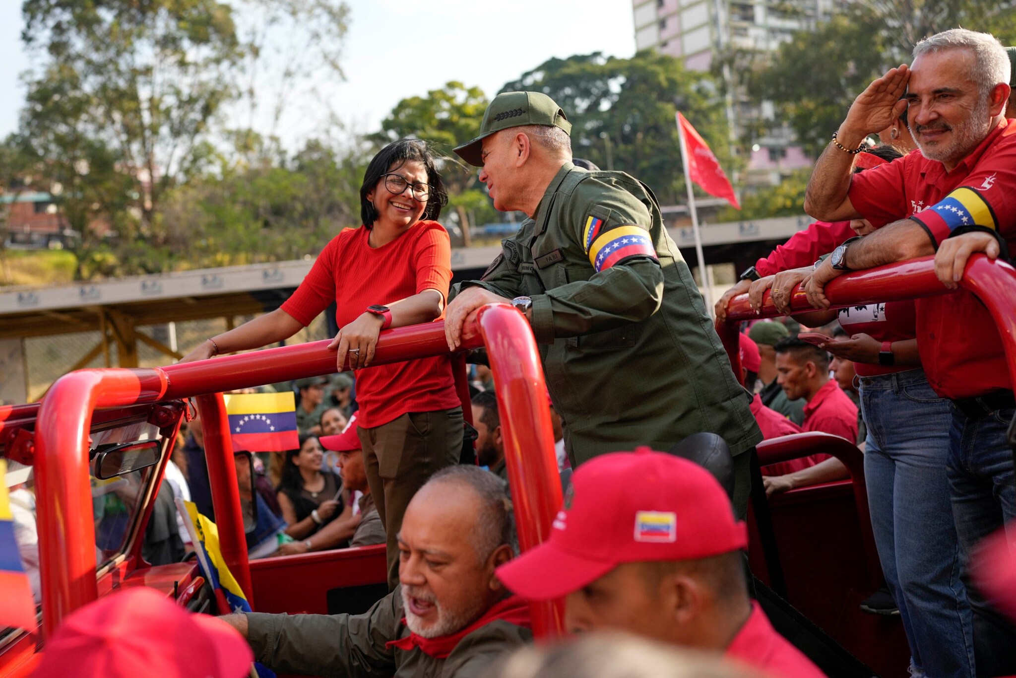 FILE - Vice President Delcy Rodriguez, left, smiles at Venezuelan Defense Minister Padrino Lopez, as they take the route that the body of late President Hugo Chavez was transported to his final resting place, during the activities marking the 10th anniversary of Chavez's death, in Caracas, Venezuela, March 15, 2023. (AP Photo/Matias Delacroix, File) FILE - Vice President Delcy Rodriguez, left, smiles at Venezuelan Defense Minister Padrino Lopez, as they take the route that the body of late President Hugo Chavez was transported to his final resting place, during the activities marking the 10th anniversary of Chavez's death, in Caracas, Venezuela, March 15, 2023. (AP Photo/Matias Delacroix, File)