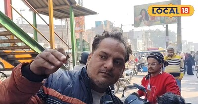 सर्विस रोड पर जाम की समस्या बताता हुआ राहगीर 