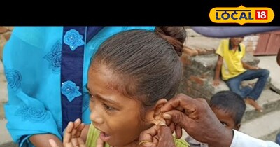 बसंत पंचमी के दिन उत्तराखंड के गांवों में बच्चों के कान छेदते परिजन 