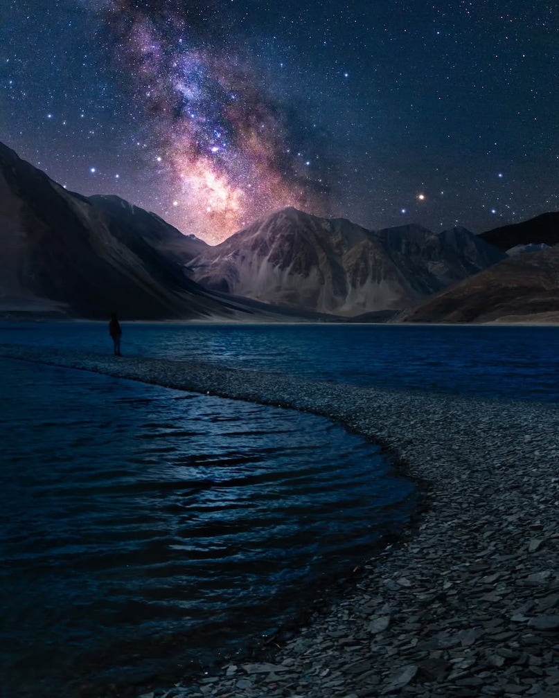Pangong Tso, Ladakh: At over 14,000 feet, this high-altitude lake offers a unique celestial view. The absolute stillness of the water at night creates perfect reflections of the moon and stars, making it one of the most romantic and quiet spots for sky-watching in the country. Pangong Tso, Ladakh: At over 14,000 feet, this high-altitude lake offers a unique celestial view. The absolute stillness of the water at night creates perfect reflections of the moon and stars, making it one of the most romantic and quiet spots for sky-watching in the country.