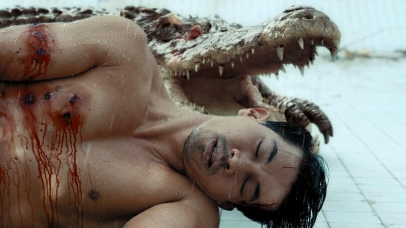 The Thai film revolves around a couple who is trapped in a 6-meter-deep pool after the water is drained out. Their situation worsened when a crocodile entered the pool with them. 