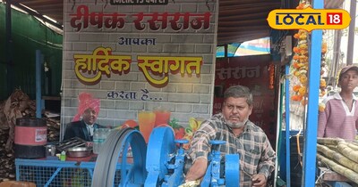 गन्ने का रस बनाते दुकान के मालिक 
