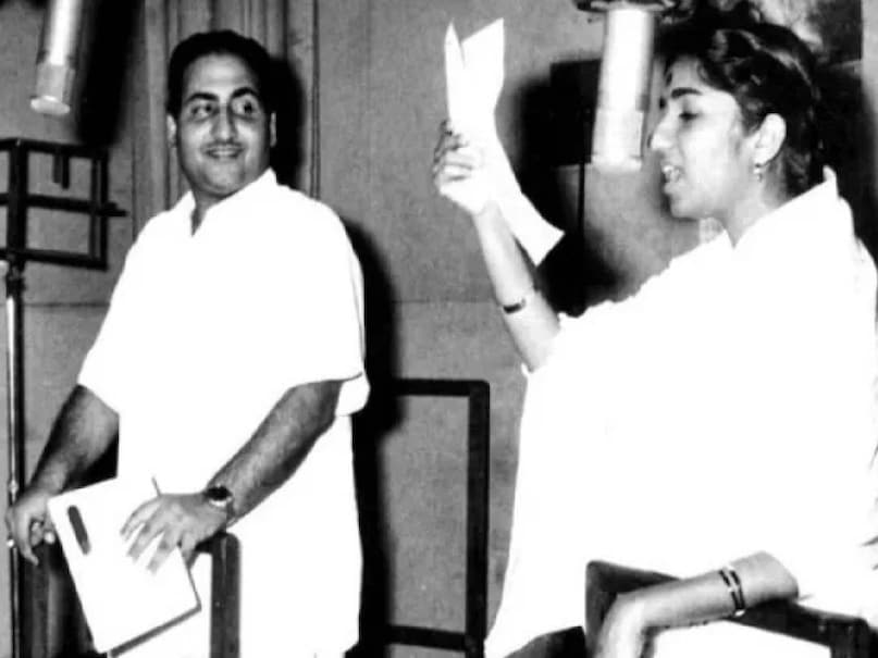 lata mangeshkar and mohammad rafi fight, lata mangeshkar and mohammad rafi fight reason in hindi, lata mangeshkar and mohammad rafi duets, mohammed rafi lata mangeshkar old song, mohammed rafi lata mangeshkar hit songs, mohammed rafi lata mangeshkar ke gane, lata mangeshkar and mohammad rafi story, lata mangeshkar death reason, why lata mangeshkar not get married, mohammed rafi death reason, bollywood news, bollywood throwback story, devanand mala sinha movie, tasveer teri dil mein jis din se utari hai song lata mangeshkar and mohammad rafi fight, lata mangeshkar and mohammad rafi fight reason in hindi, lata mangeshkar and mohammad rafi duets, mohammed rafi lata mangeshkar old song, mohammed rafi lata mangeshkar hit songs, mohammed rafi lata mangeshkar ke gane, lata mangeshkar and mohammad rafi story, lata mangeshkar death reason, why lata mangeshkar not get married, mohammed rafi death reason, bollywood news, bollywood throwback story, devanand mala sinha movie, tasveer teri dil mein jis din se utari hai song