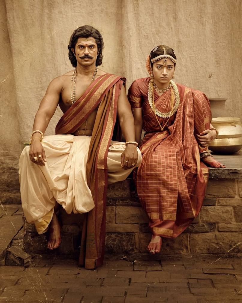 Ranaballi: Ranaballi will mark the first on-screen appearance of newlyweds Vijay Deverakonda and Rashmika Mandanna together after a long hiatus, making it one of the most eagerly awaited releases. The film’s first look was unveiled shortly after their wedding, amplifying fan excitement even further.Set against a turbulent historical backdrop, the Telugu drama promises intense conflict, rebellion, and grand, larger-than-life storytelling. Ranaballi: Ranaballi will mark the first on-screen appearance of newlyweds Vijay Deverakonda and Rashmika Mandanna together after a long hiatus, making it one of the most eagerly awaited releases. The film’s first look was unveiled shortly after their wedding, amplifying fan excitement even further.Set against a turbulent historical backdrop, the Telugu drama promises intense conflict, rebellion, and grand, larger-than-life storytelling.