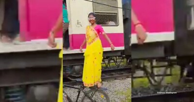 ट्रेन के सामने साइकिल पर खतरनाक डांस, स्टंट देख भड़के यूजर्स!