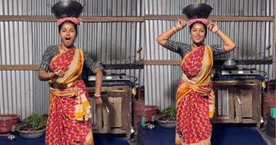 भाभी जी का अनोखा अंदाज: सिर पर गरम कढ़ाई रख 'सावन में' गाने पर लगाए जबरदस्त ठुमके.