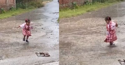 स्कूल से छुट्टी मिलते ही बच्ची ने बारिश में मचाया धमाल, कीचड़ में कूदकर याद दिलाया बचपन.