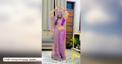 घूंघट में सपना सिंह का 'कजरा रे' डांस वायरल, मुस्कान ने जीता सबका दिल.