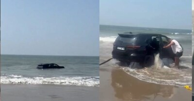 गोवा बीच पर फॉर्च्यूनर स्टंट पड़ा भारी, समुद्र में फंसी SUV, JCB से निकालना पड़ा