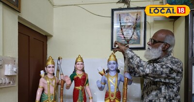 मूर्ति पर श्रृंगार करते हुए कलाकार 