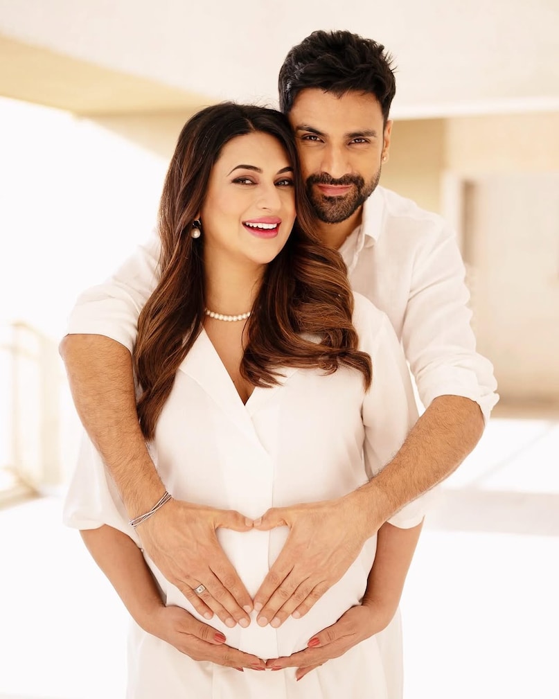 Divyanka Tripathi, Vivek Dahiya, baby announcement by Divyanka Tripathi, pregnancy news, celebrity baby news, Indian TV industry, दिव्यांका त्रिपाठी, विवेक दहिया, दिव्यांका जल्द ही मां बनने वाली हैं, जल्द ही मां बनने वाली हैं ने प्रेग्नेंसी की खबर को कंफर्म किया, दिव्यांका ने बेबी बंप फ्लॉन्ट कर दी गुड न्यूज