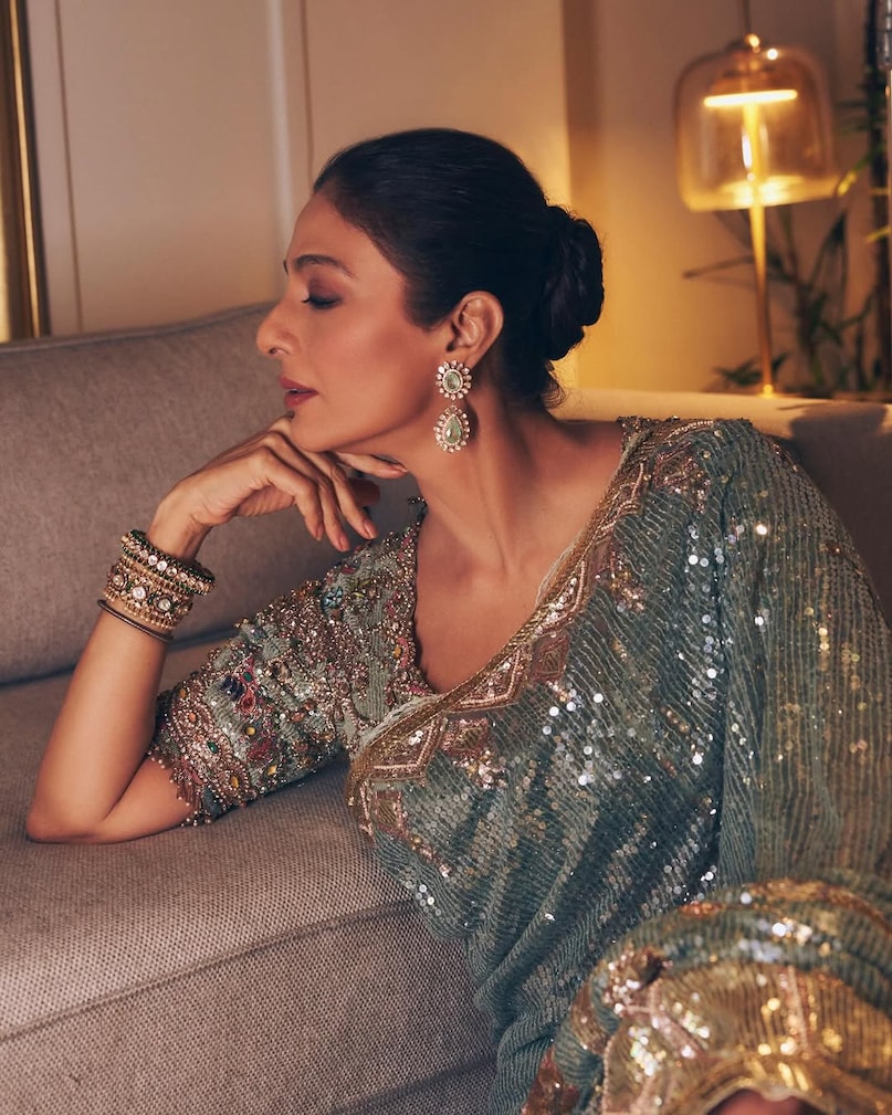 Tabu frosted blue saree look, तबु फ्रॉस्टेड ब्लू साड़ी लुक, Tabu sequin tulle saree, तबु सीक्विन ट्यूल साड़ी, Art deco saree design, आर्ट डेको साड़ी डिजाइन, Birds of Paradise saree, बर्ड्स ऑफ पैराडाइज साड़ी, tabu latest look,tabu saree look, how to style a frosted blue saree,tabu vintage royal look tips,birds of paradise motif saree, art-deco pattern saree design,edwardian lace blouse ideas,modern saree draping for weddings,best saree for summer events 2026,celebrity fashion tips
