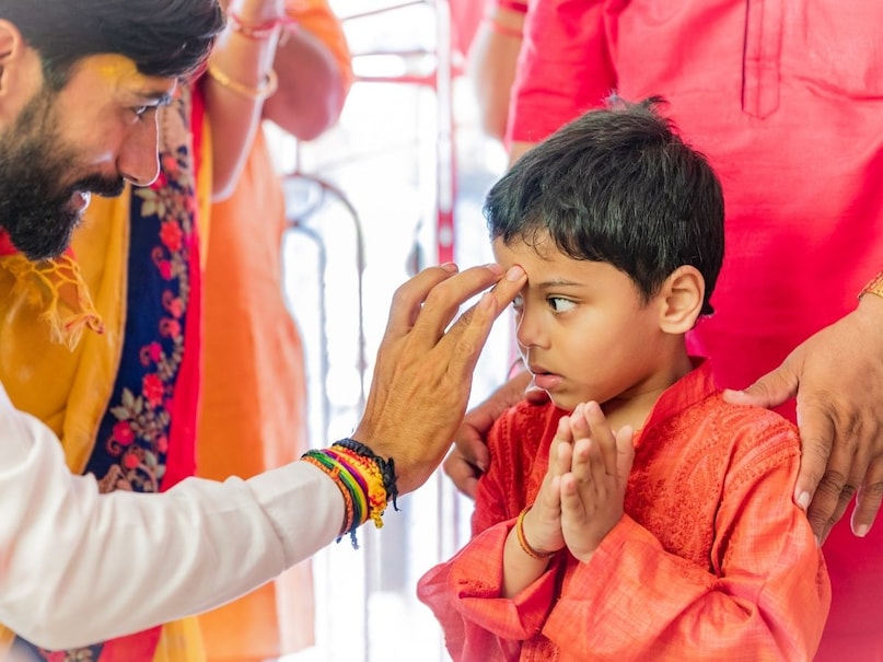 which finger for tilak