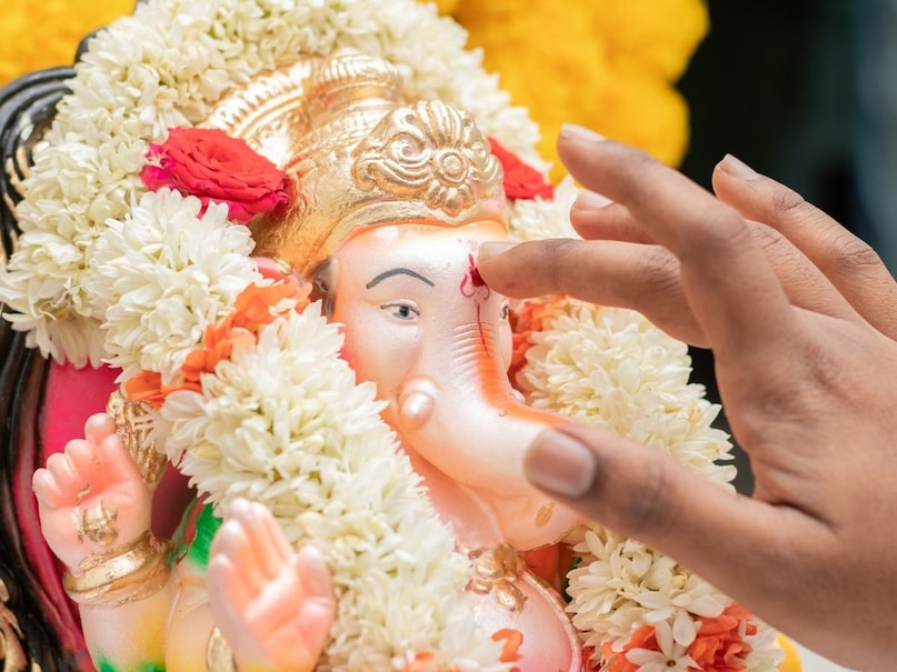 which finger for tilak