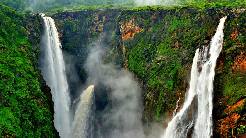 Shivamogga: Reaching Shivamogga by train takes around 4.5 to 5 hours, and the journey is well worth it for its natural attractions. The majestic Jog Falls, one of India’s tallest waterfalls, is a major draw, while the nearby Sakrebailu Elephant Camp offers a unique wildlife experience. The lush rainforests of Agumbe, often called the ‘Cherrapunji of the South,’ add to its appeal. Shivamogga: Reaching Shivamogga by train takes around 4.5 to 5 hours, and the journey is well worth it for its natural attractions. The majestic Jog Falls, one of India’s tallest waterfalls, is a major draw, while the nearby Sakrebailu Elephant Camp offers a unique wildlife experience. The lush rainforests of Agumbe, often called the ‘Cherrapunji of the South,’ add to its appeal.