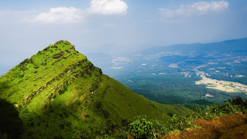 Chikmagalur, Karnataka: As the legendary birthplace of Indian coffee, Chikmagalur offers a deep dive into history. The hills are dotted with heritage estates where you can learn about bean processing, visit the Coffee Museum, and hike to the scenic Baba Budangiri shrine. Chikmagalur, Karnataka: As the legendary birthplace of Indian coffee, Chikmagalur offers a deep dive into history. The hills are dotted with heritage estates where you can learn about bean processing, visit the Coffee Museum, and hike to the scenic Baba Budangiri shrine.
