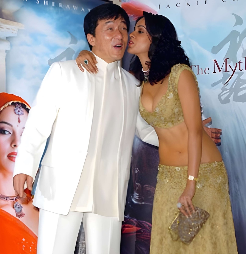 Mallika Sherawat Cannes Red Carpet 2005, Jackie Chan and Mallika Sherawat The Myth Promotion, Mallika Sherawat Bold Outfit Controversy at Cannes, Cannes Film Festival Bollywood Red Carpet History, Mallika Sherawat First Appearance at Cannes Film Festiva, मल्लिका शेरावत कान्स फिल्म फेस्टिवल डेब्यू, जैकी चैन और मल्लिका शेरावत द मिथ, कान्स रेड कार्पेट पर मल्लिका का बोल्ड लुक, मल्लिका शेरावत के कपड़ों पर विवाद, मर्डर एक्ट्रेस मल्लिका शेरावत कान्स रेड कार्पेट