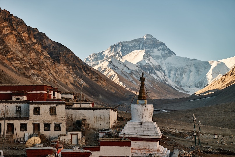 Rongbuk Monastery (Tibet): Perched at an astonishing 5,000 meters on Mount Everest's northern slopes, Rongbuk is the world’s highest monastery. It offers a stark, windswept sanctuary where resilient monks and nuns share a sacred space directly facing the mountain's colossal, snowy north face.