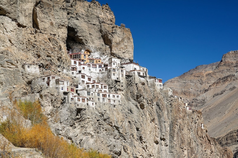 Phugtal Gompa (India): Hidden in Ladakh's remote Zanskar region at 3,800 meters, Phugtal is miraculously chiseled into the sheer limestone cliff face of a river gorge. Built around a natural cave, this honeycomb-like structure is accessible only by a trek across footbridges.