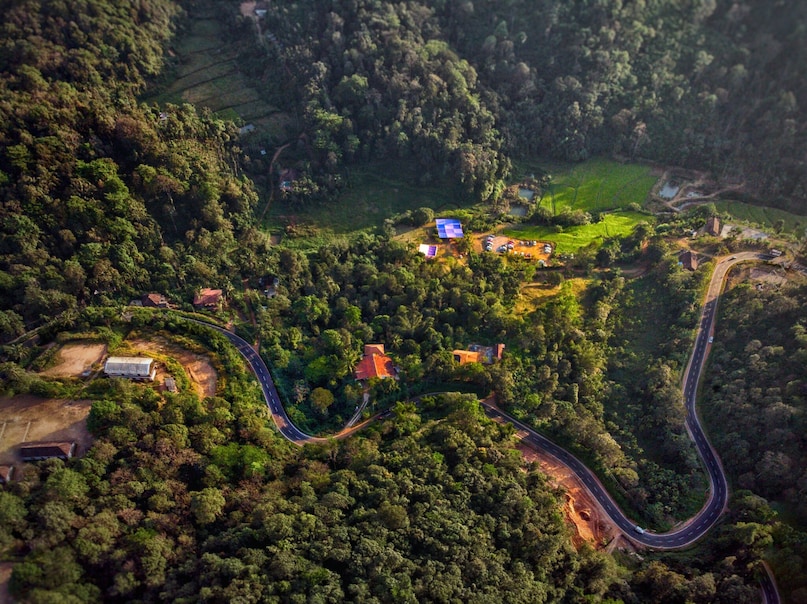 Coorg, Karnataka: Often called the "Scotland of India," Coorg’s mist-covered coffee plantations, sprawling estates, and roaring waterfalls evoke the Scottish countryside. The damp earth, endless canopy of green, and chilly, rain-washed air make it an enchanting, ethereal escape from reality. Coorg, Karnataka: Often called the "Scotland of India," Coorg’s mist-covered coffee plantations, sprawling estates, and roaring waterfalls evoke the Scottish countryside. The damp earth, endless canopy of green, and chilly, rain-washed air make it an enchanting, ethereal escape from reality.