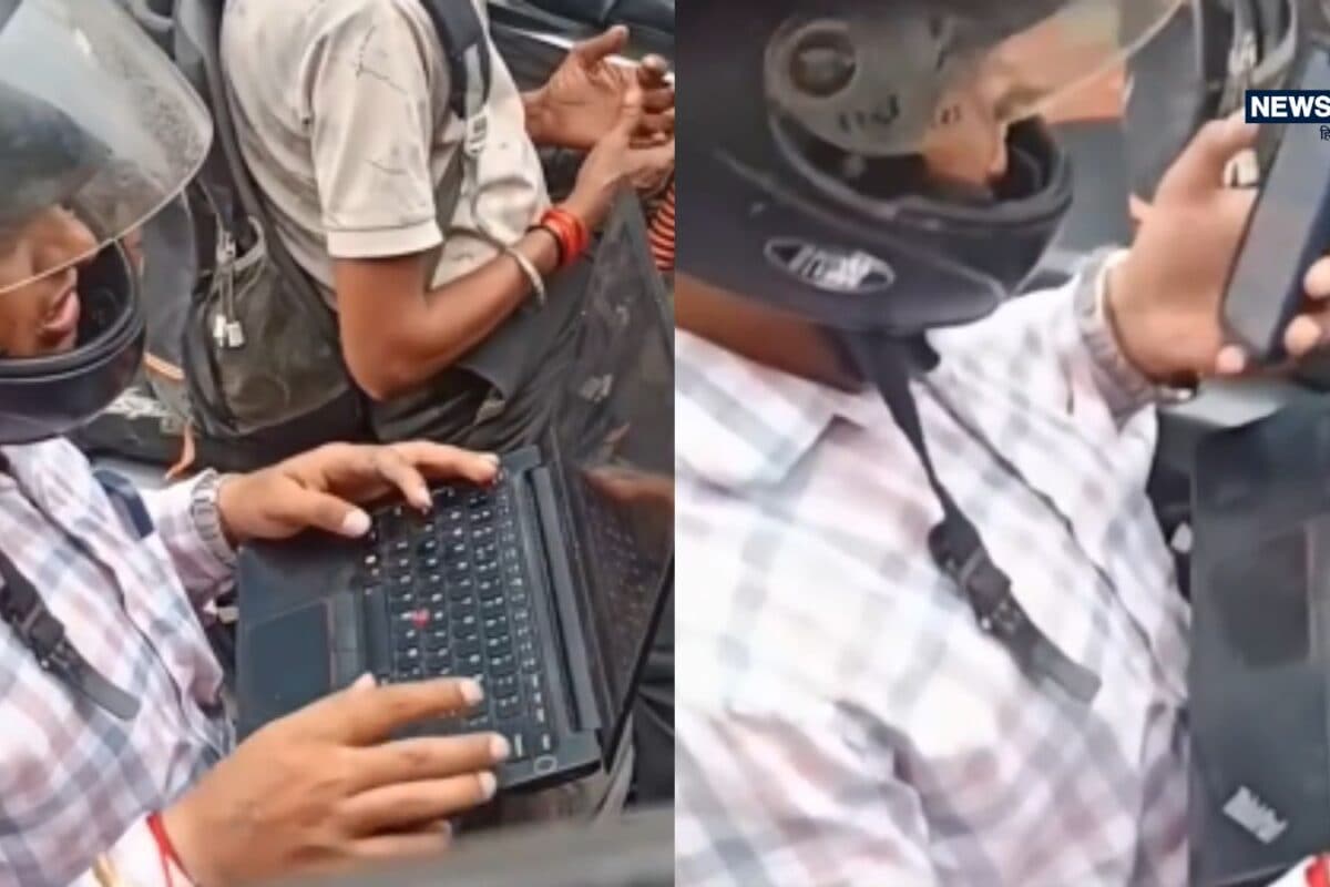 Viral: सिर्फ 5 मिनट का सिग्नल... बाइक की टंकी पर ही खुल गया लैपटॉप, देख लोग बोले- 'यही है कॉर्पोरेट लाइफ'