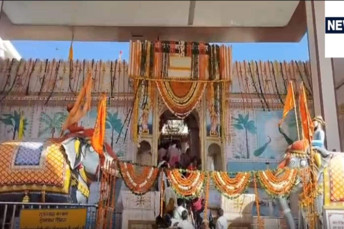 Charbhuja Nath Temple Dressed in Vibrant Flowers and Traditional Mewari Turban