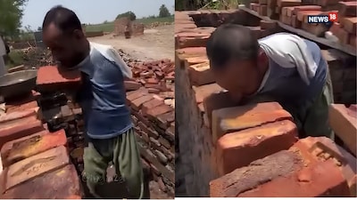 दोनों हाथ नहीं, फिर भी ईंट उठा रहा