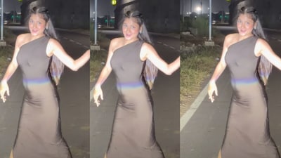 Girl's Midnight Highway Dance Goes Viral: Car Headlights Create Cinematic Backdrop.
