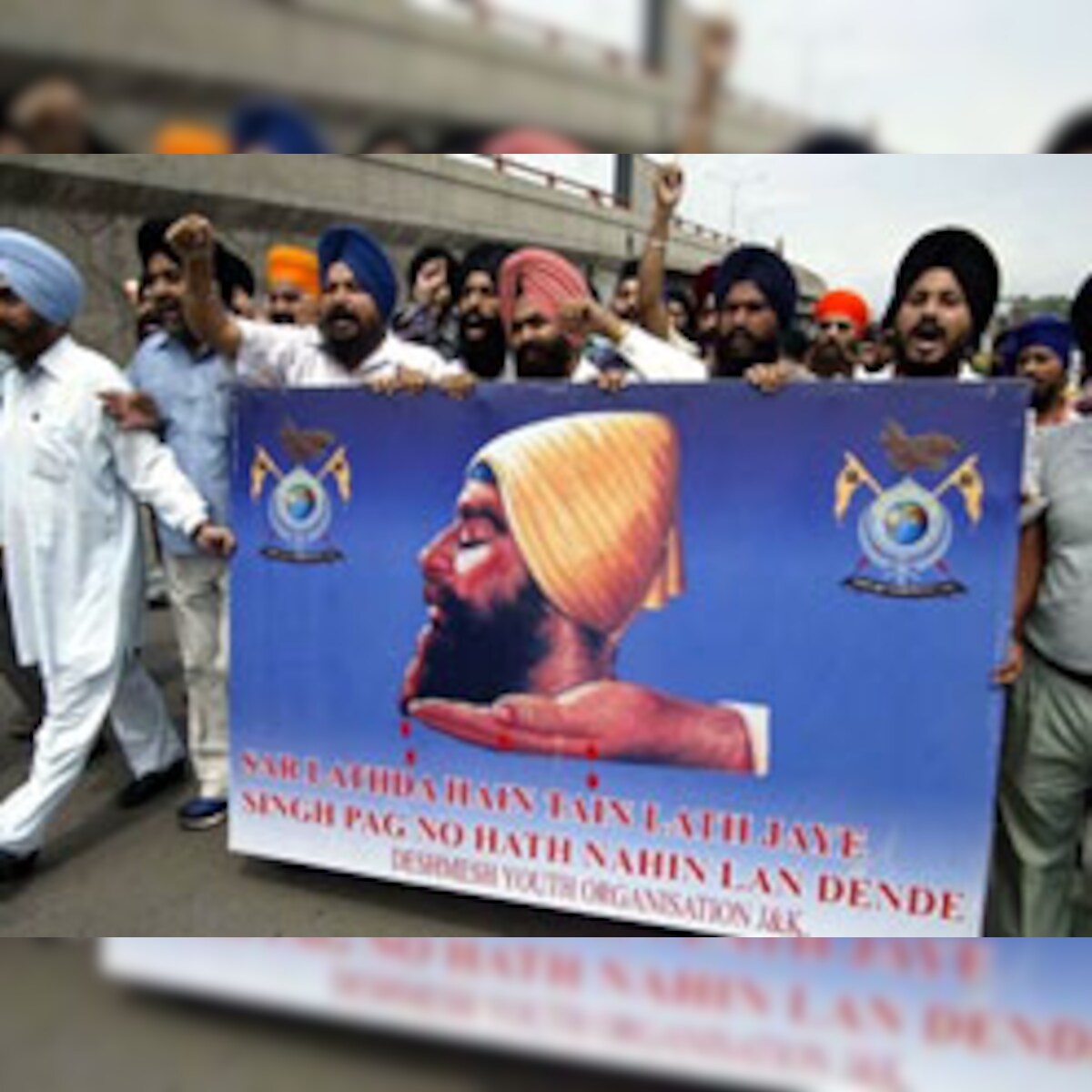Sikh boy's hair cut in Haryana Sikh boy's hair cut in Haryana