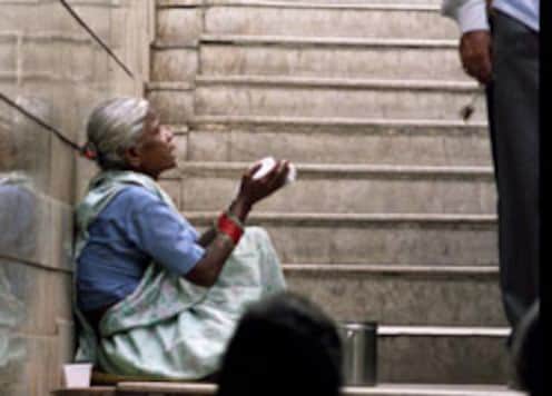 <b>Beggar strikes it rich on strike day</b>