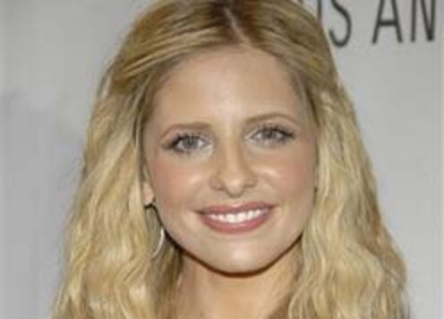 Sarah Michelle Gellar tries to slip away with X-rated props