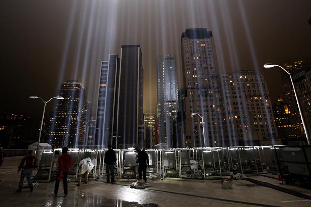 Workers adjust beams of the Tribute in Lights ahead of the tenth anniversary of the September 11 terrorist attacks on September 7, 2011 in New York City. The Tribute in Light is comprised of 88 7000 watt searchlights that beam into the sky near the site of the World Trade Center in remembrance of the September 11 attacks.
