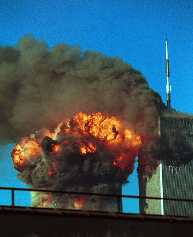 A fire ball explodes one of the towers at the world trade center after being hit by two planes, September 11, 2001 In New York City.
