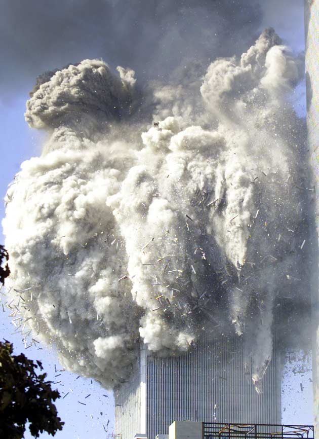 The World Trade Center tower two turns into a mushroom cloud as it falls to the ground after a fire September 11, 2001. Both towers of the World Trade Center have fallen after planes crashed into the buildings. Three hijacked planes crashed into major US landmarks on Tuesday, destroying both of New York's mighty twin towers and plunging the Pentagon in Washington into flames, in an unprecedented assault on key symbols of US military and financial power.