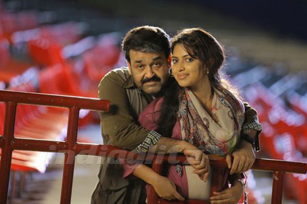 First Look Mohanlal Amala Paul S Malayalam Film Run Baby Run First Look Mohanlal Amala Paul S Malayalam Film Run Baby Run