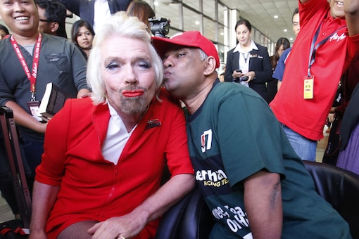 Snapshot: Why is business magnate Richard Branson dressed as a woman?