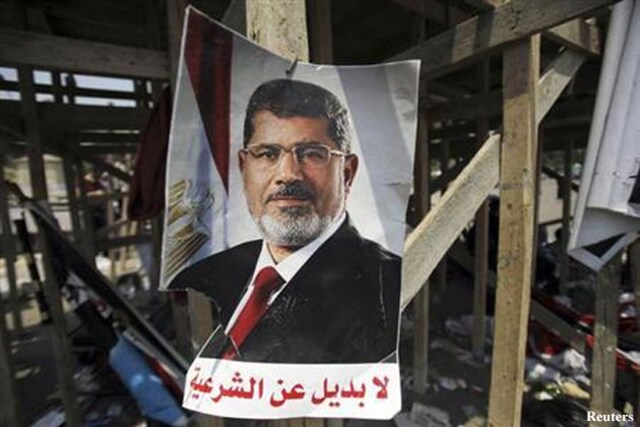 Muslim Brotherhood chief Mohamed Badie vows sacrifice to defend Morsi