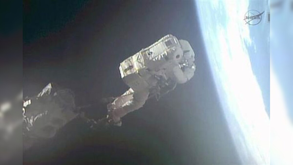 NASA aborts spacewalk after water leak in astronaut's helmet