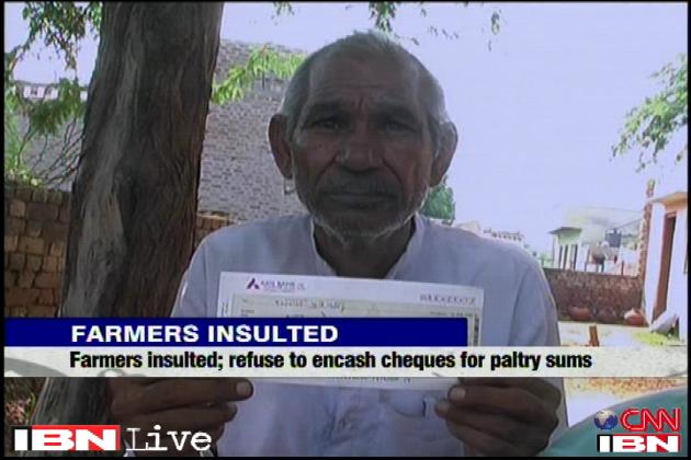 Rs 2 cheques: Crop damage compensation for farmers in Haryana - News18